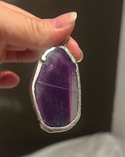 Purple agate stone pendant.