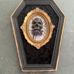 Coffin shaped wall hanging