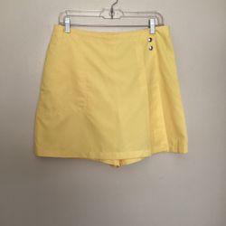 Women’s IZOD FXG Cool FX 100% polyester yellow golf skirt… Size 8