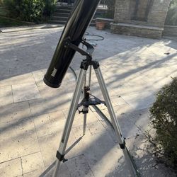 Bushnell telescope, likely a 3-inch Altazimuth Reflector model.  