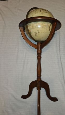 Vintage Bombay Replogle World Globe on wood stand.