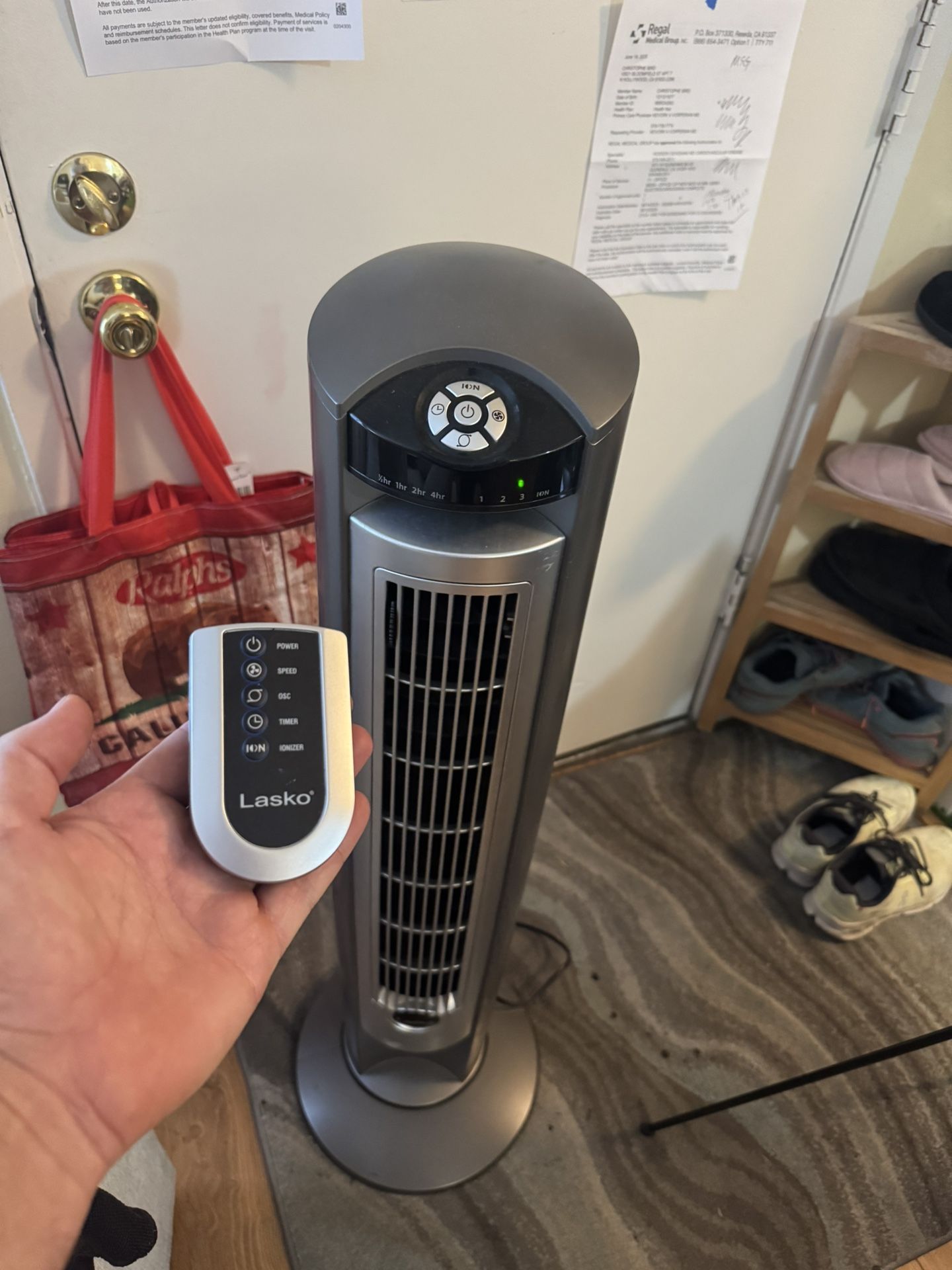 Large Lasko Tower floor fan with remote