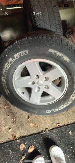2 Jeep Rims take all 2 $20