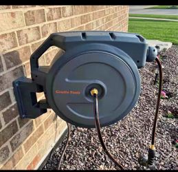 Garden Retractable Hose Reel-5/8 in.-90 ft., Metal Bracket, Wall Mounted, Dark Grey   New   Retail price $189. Our price is $90.   Giraffe Tools  Mode