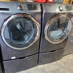 Samsung Front Load Washer And Stackable Gas Dryer Set With Pedestals 