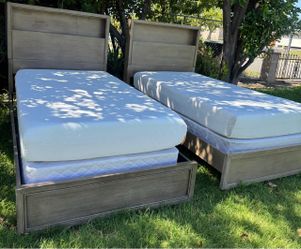 Two beutiful twin beds with good mattress sets $150 each or $300 both