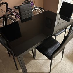 Table And Four Chairs 