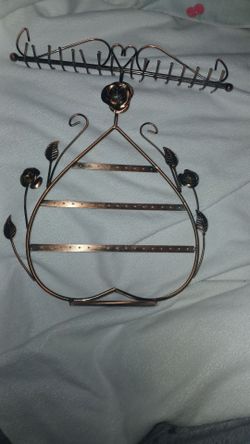 Pretty bronze metal heart shaped stand