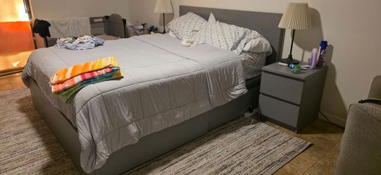 Gray Ikea Malm Platform Bed Frame with four under bed drawers and 2 night stands