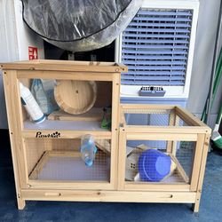 Hamster cage with supplies