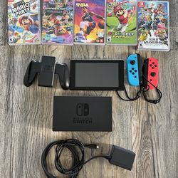Nintendo Switch with 2 Controllers and 5 Games