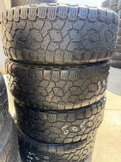 SET OF FOUR 28560r20 TOYO AT TIRES