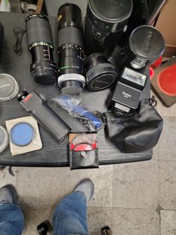 CANON AND VIVITAR Camera lenses and other items related.