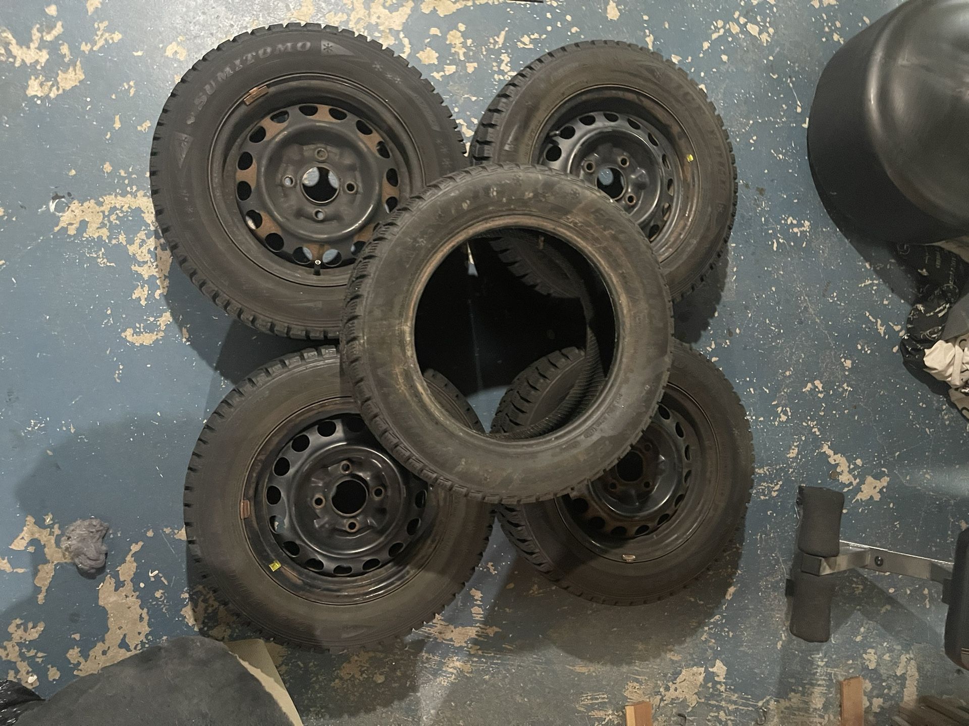 4 Sumitomo Snow Tires W/ Rims And A Spare Tire