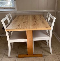 Wood dinning table with four chairs