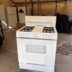 GE gas Stove everything works well 30 In