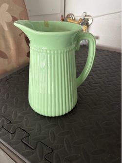 Sage green ceramic vase for flowers or drinks