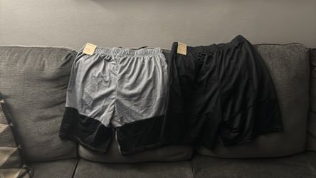 Guys brand new shorts Nike size large both $50