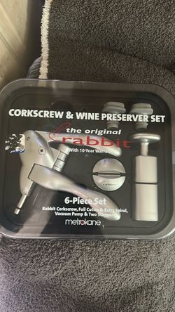 Corkscrew and wine preserver set