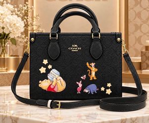 Coach x Disney Winnie the Pooh Signature Handbag