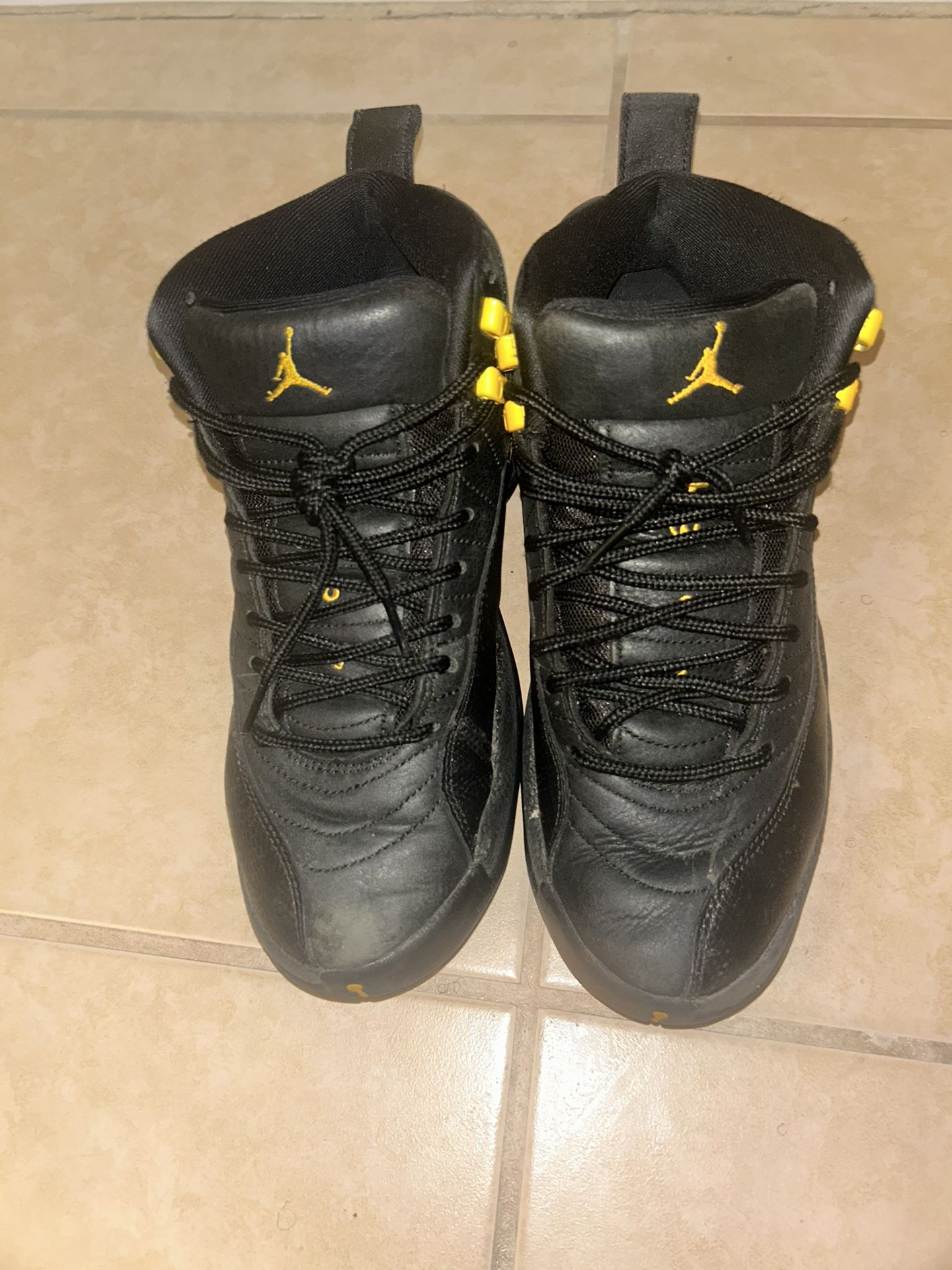 jordan 12 black taxi