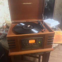 Crosley it plays,records, cds , cassettes and the radio  no remote