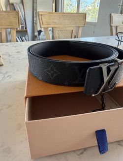 Silver and black belt