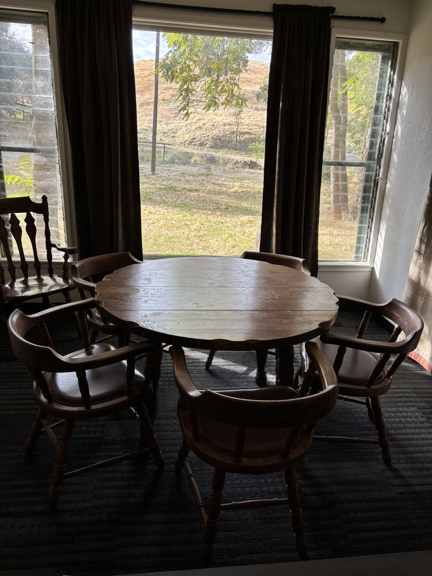 Antique dining table with five chairs