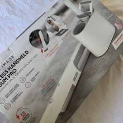 SHARPER IMAGE CORDLESS VAC  NEW