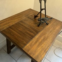 suitable as a surface for beverages and books.