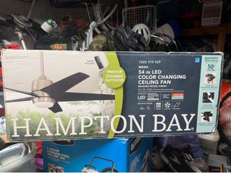 Hampton Bay Mena 54-inch LED indoor/outdoor ceiling fan with a brushed nickel finish and included remote control.