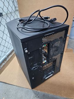 $699  Custom Built Desktop Gaming PC Tower.

Black mid-tower desktop PC with tempered glass side panel. Back panel shows USB ports, audio jacks, displ