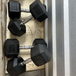 New pair of 30 and 35lb rubber dumbbell in box $130   