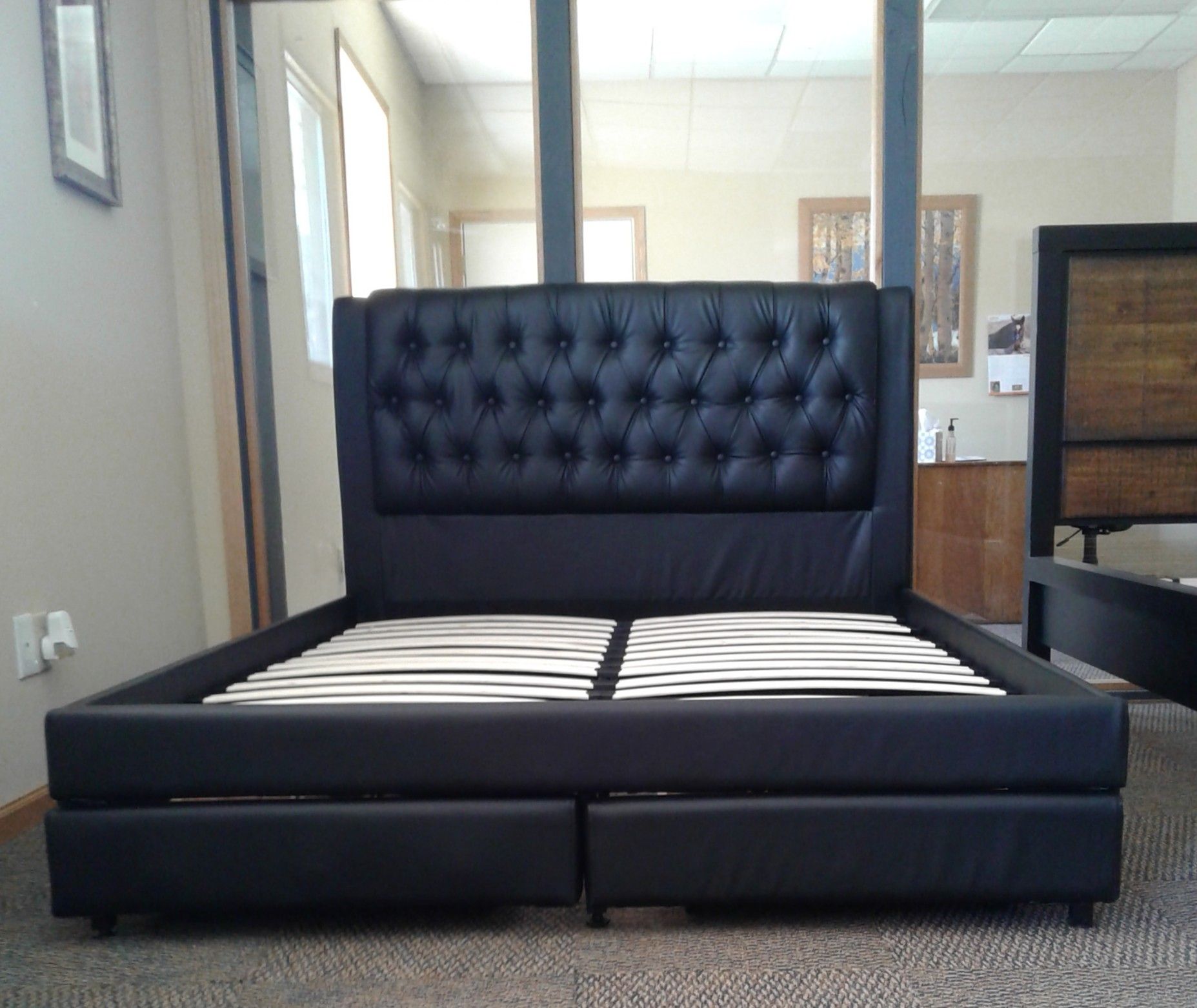 queen leather bed. brand new