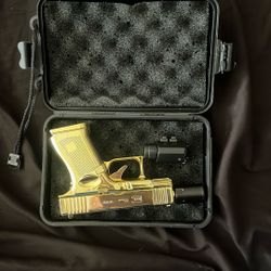 Golden Pistol Lighter (San Bernardino Ca)