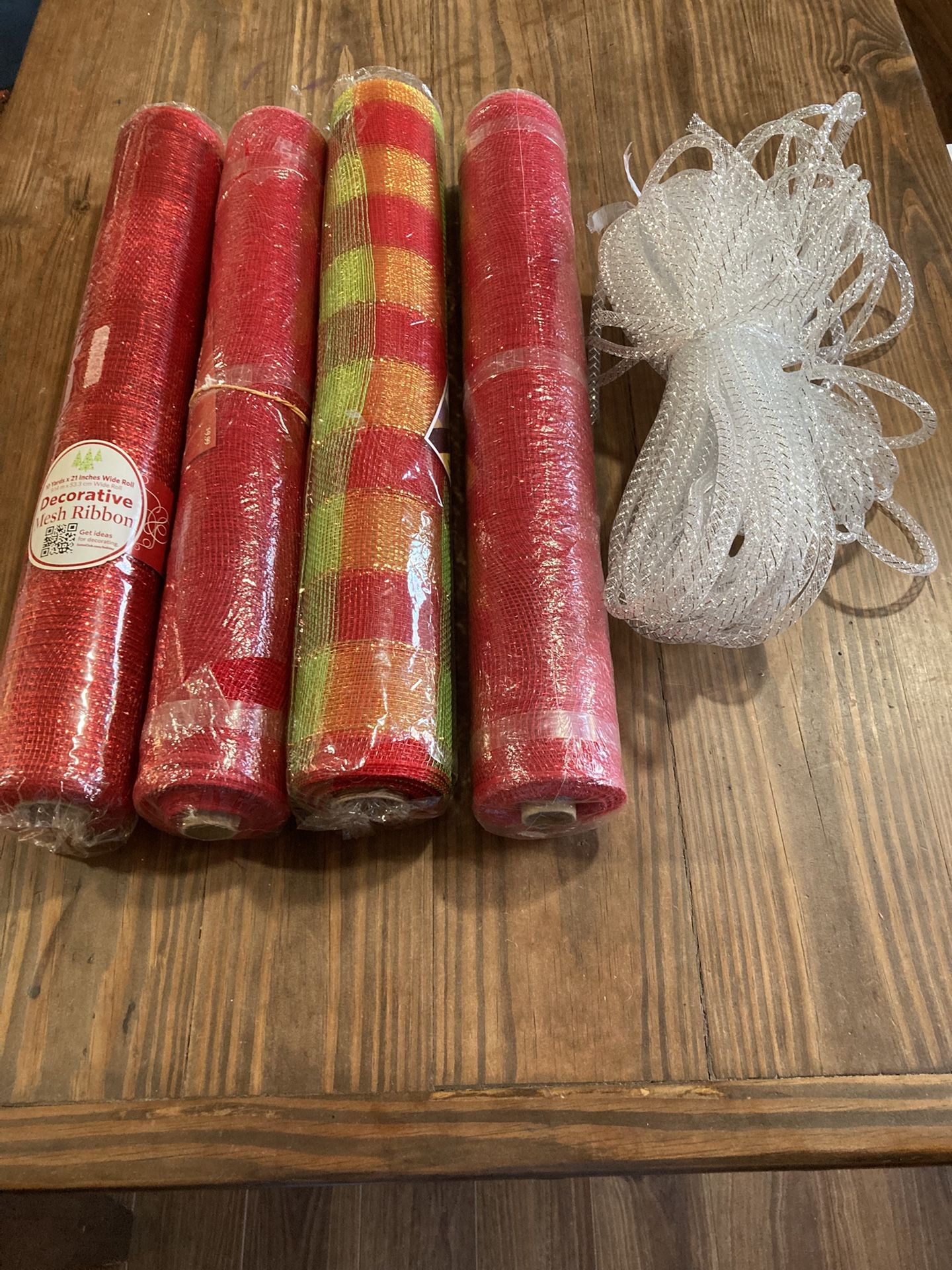 4 Rolls Of Unused Mess And 1 Roll Of Tubing
