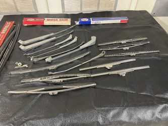 Wiper arms and blades