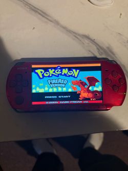 Red psp 3000 with 64gb worth of games