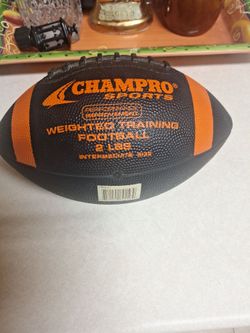NEW  CHAMPRO WEIGHTED FOOTBALL 2 POUND.  $20  FIRM PRICE