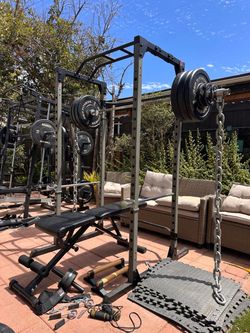OLYMPIC SQUAT RACK WITH OLYMPIC WEIGHTS AND BENCH