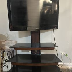Rotating Three Tier Glass TV Stand  (TV Not Included)