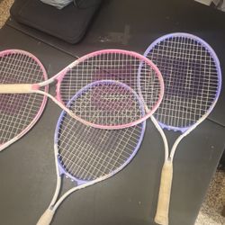 Four Tennis Rackets