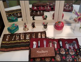 Makeup brush holders