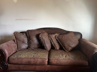 Ashley furniture 2 couches and a coffee table
