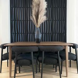 6 Black boucle chairs and Dining table