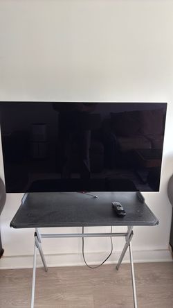 LG 42” OLED Smart TV + Magic Remote – Perfect Picture, Works Flawlessly