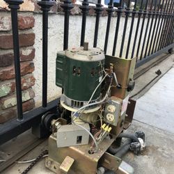 Heavy electric gate not moving smoothly? Full system check and motor adjustment