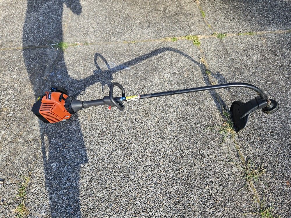 Remington RM2510 Rustler 25cc 2 Cycle 16" Curved Shaft Gas Trimmer for