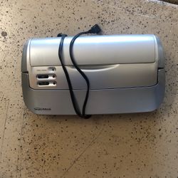 Vacuum sealer with extra rolls