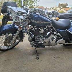 2003 Road King. Extra Upgrades 21inch Wheel. Chromed Out. Extra Bags , Also Includes Windshield. Extra Clean. Stored In Garage All Time! Less than 20k